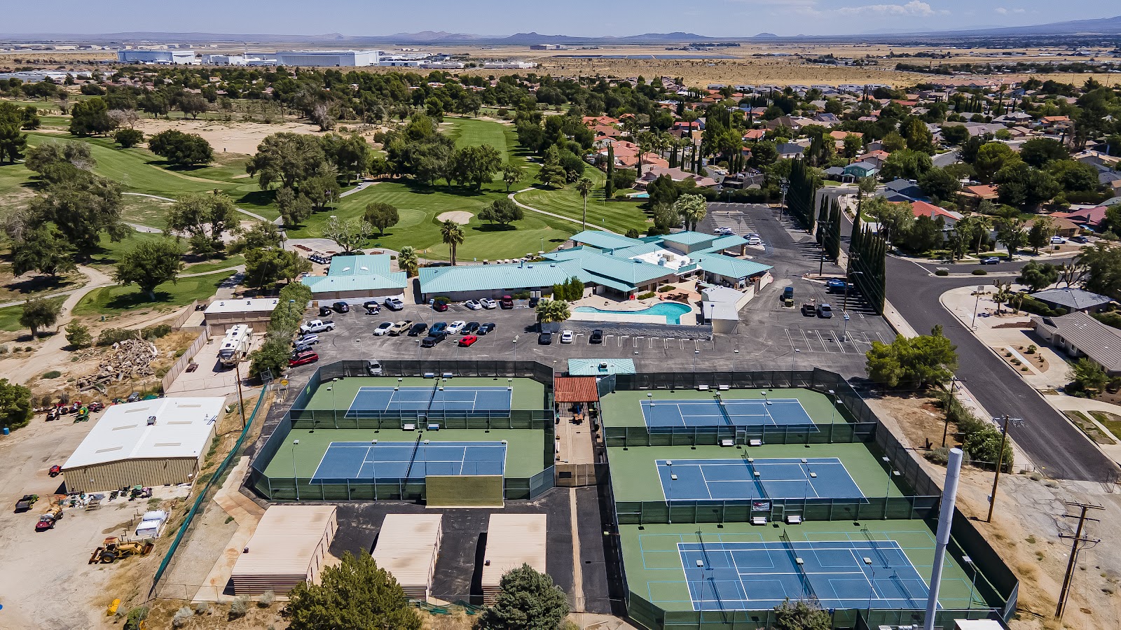 Aerial View of Clubhouse, Swimming Pool, and Sports Complex